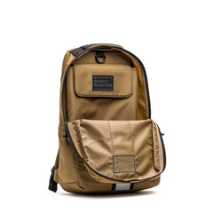 The tan Basic Rucker® backpack features a front flap pocket and top handle, ideal for rucking, shown against a white background.