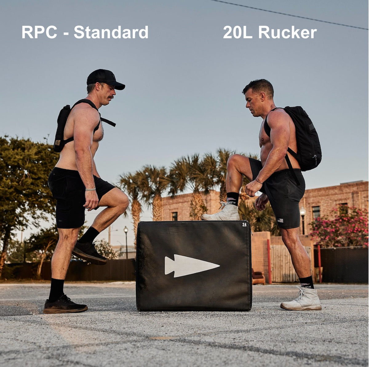 Two men wearing Ruck Plate Carrier 3.0 backpacks do step-ups on a box outdoors, known for providing great lumbar support during workouts.