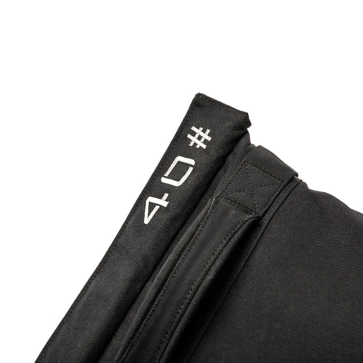 Close-up of a Simple Training Sandbags black fabric sandbag with white 