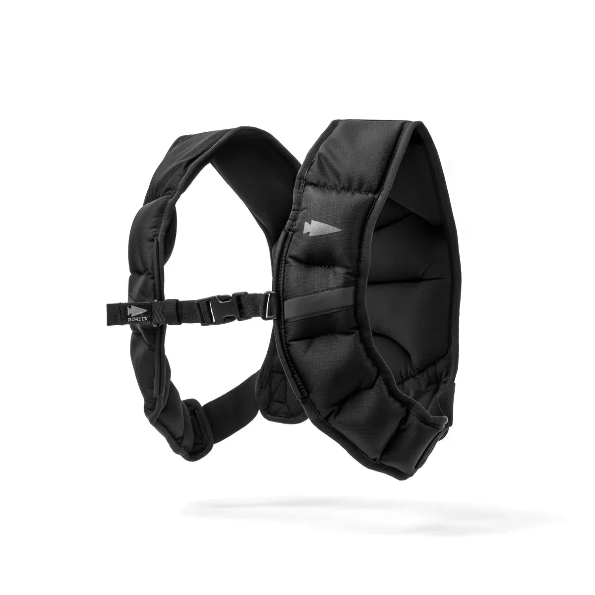 The Spy Ruck is a black padded shoulder harness featuring adjustable straps and a side buckle, designed as essential women’s fitness gear, shown against a white background.