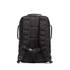 The Rucker 5.0, shown from the back, features padded shoulder straps and a padded back panel—a durable black rucksack ideal for rucking enthusiasts.