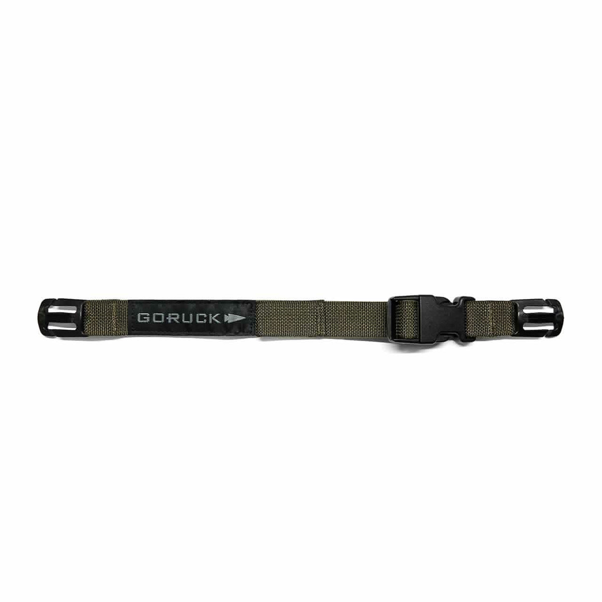 The Training Sternum Strap in green features a black buckle, designed for adjustable rucksack straps and MOLLE webbing. It is shown laid flat on a white background.